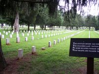 White markers dating from the Civil War through present times bear silent vigil for those who have fallen defending our country.